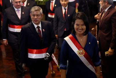Peru's President Keiko Fujimori and Prime Minister Luis Galarreta leave