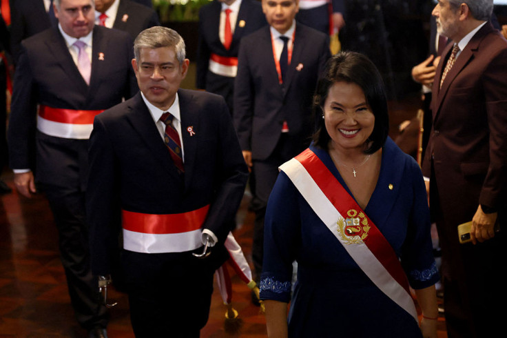 Peru's President Keiko Fujimori and Prime Minister Luis Galarreta leave