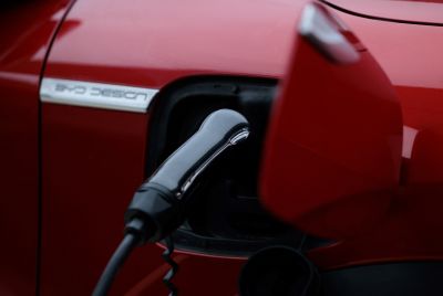 A photo shows a power outlet for charging a car