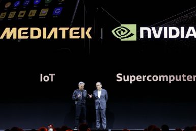 MediaTek CEO Rick Tsai (R) talks with Nvidia CEO Jensen