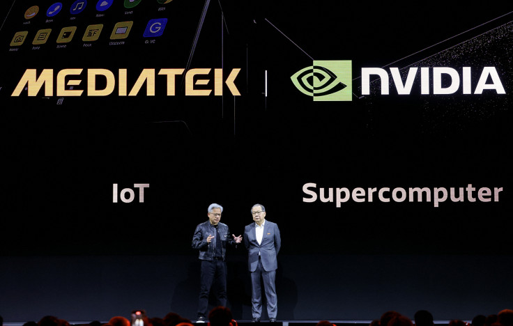 MediaTek CEO Rick Tsai (R) talks with Nvidia CEO Jensen