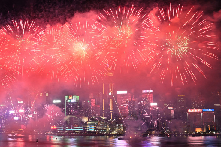 Fireworks light up over Victoria Harbour to commemorate China's National